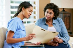 caregiver showing some result to patient